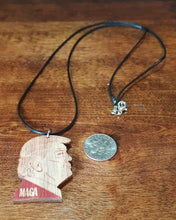 Load image into Gallery viewer, Picture of our Donald Trump necklace.